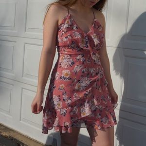 Pink floral dress with ruffle detail